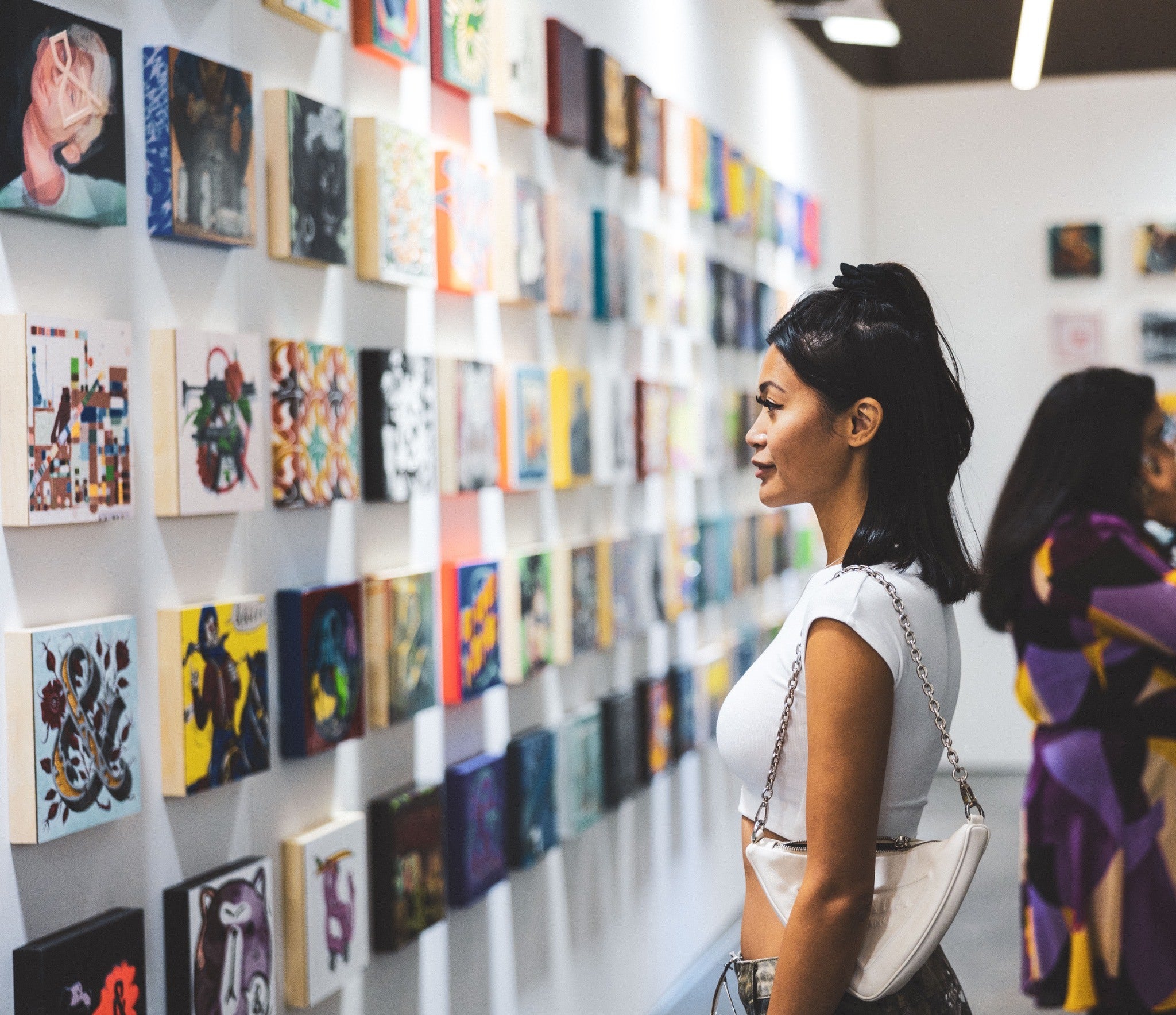 Visitors viewing artworks at Known Gallery